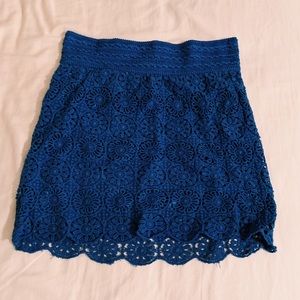 Blue lace mini skirt